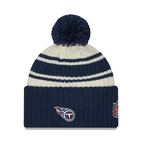 Tennessee Titans New Era 2022 Sideline Sport Cuffed Pom Knit Hat - Cream/Navy