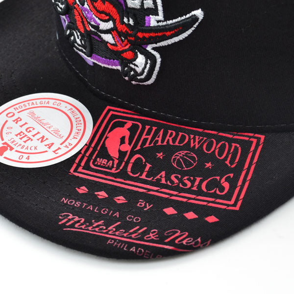 Toronto Raptors Mitchell & Ness SUPER REMIX Snapback Hat - Black/Purple