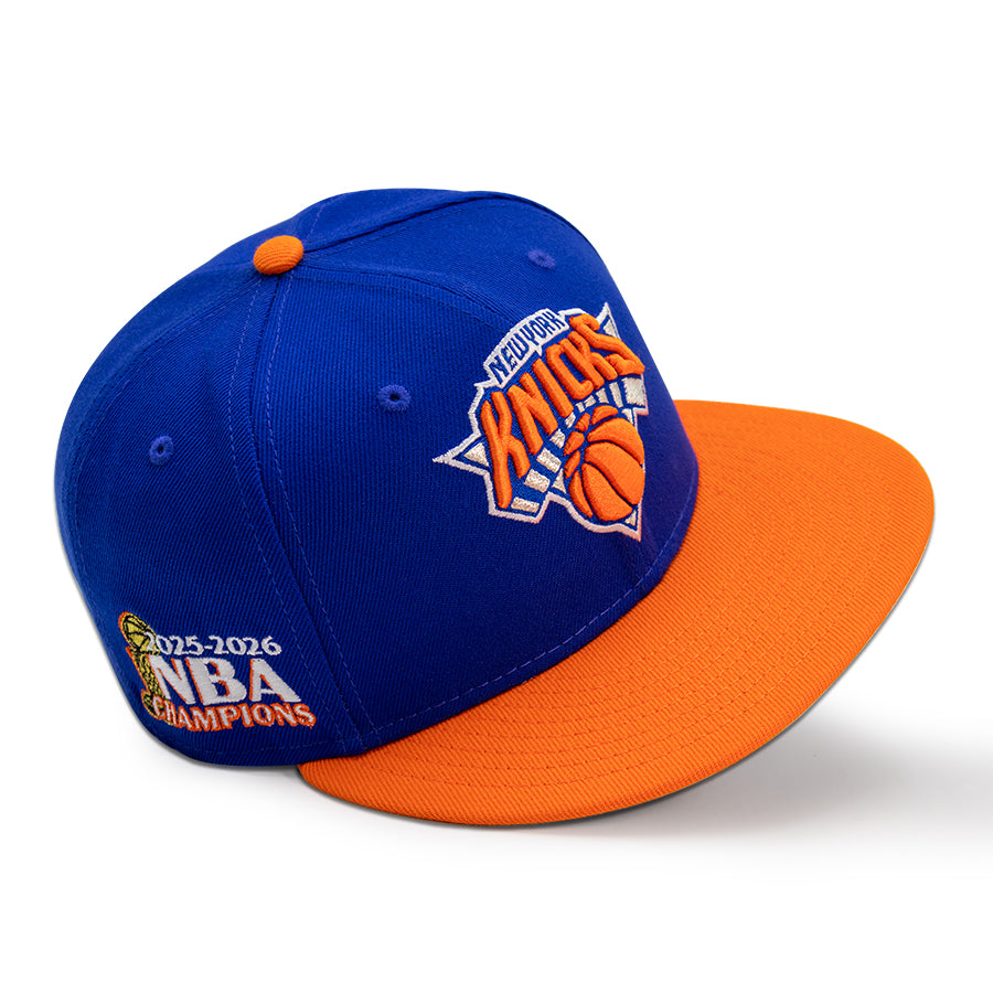 New York Knicks "2026 NBA CHAMPIONS" Exclusive New Era 59FIFTY Fitted Hat - Majestic Blue /Orange