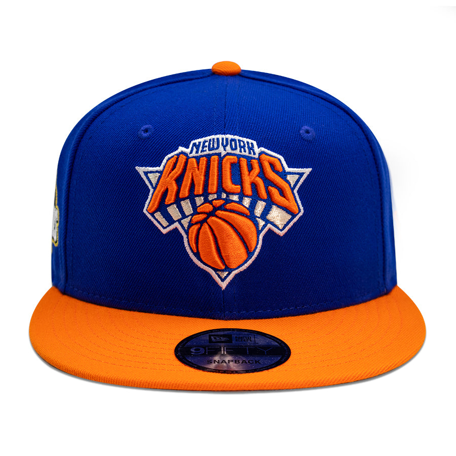 New York Knicks "2026 NBA CHAMPIONS" 2Tone New Era 9Fifty Snapback Hat - Royal/Orange