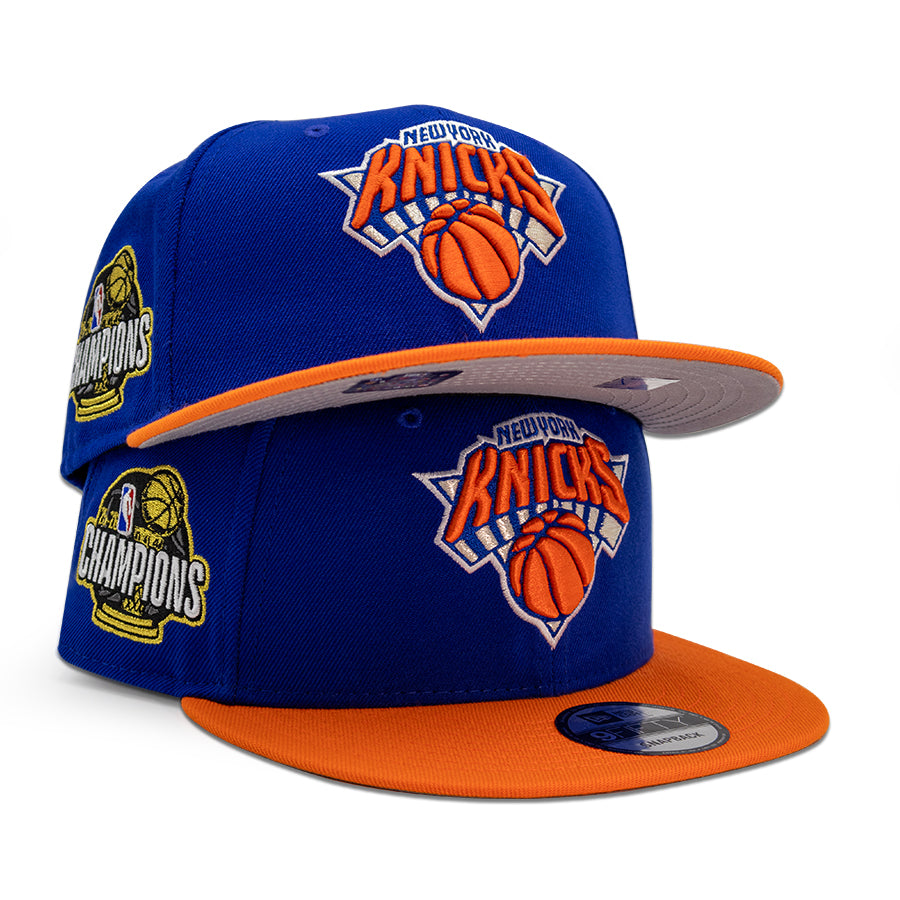 New York Knicks "2026 NBA CHAMPIONS" 2Tone New Era 9Fifty Snapback Hat - Royal/Orange