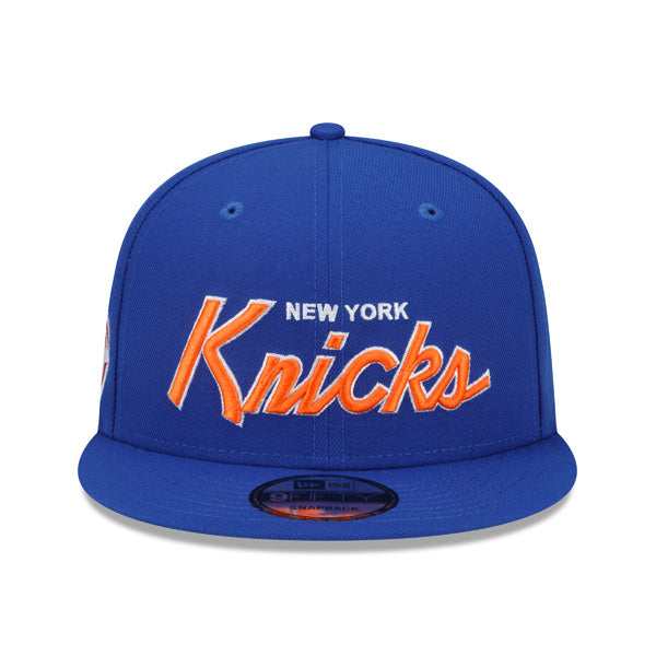 New York Knicks New Era NBA CLASSIC SCRIPT Snapback Hat – Royal/Orange