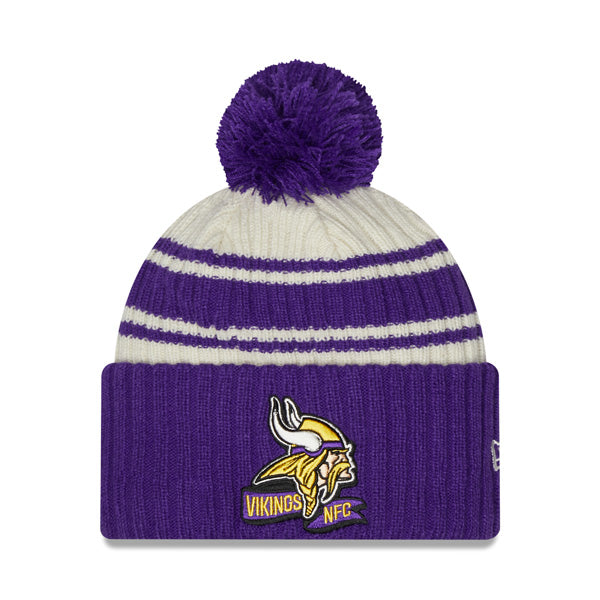 Minnesota Vikings New Era 2022 Sideline Sport Cuffed Pom Knit Hat - Cream/Purple