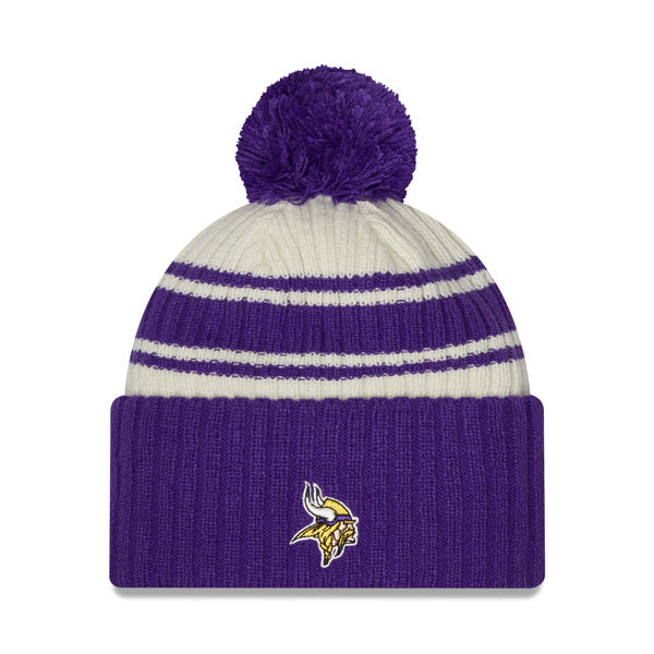 Minnesota Vikings New Era 2022 Sideline Sport Cuffed Pom Knit Hat - Cream/Purple