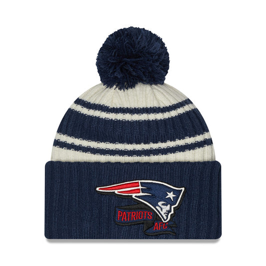 New England Patriots New Era 2022 Sideline Sport Cuffed Pom Knit Hat - Cream/Navy