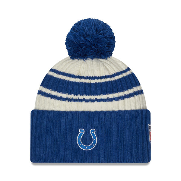 Indianapolis Colts New Era 2022 Sideline Sport Cuffed Pom Knit Hat - Cream/Blue