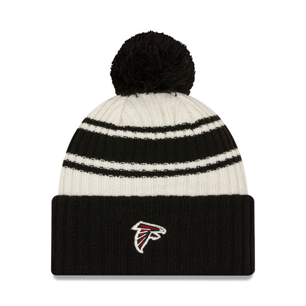 Atlanta Falcons New Era 2022 Sideline Sport Cuffed Pom Knit Hat - Cream/Black