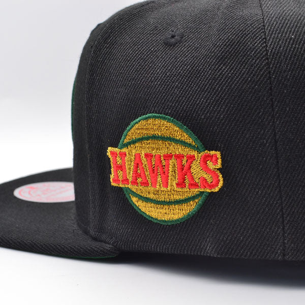 Atlanta Hawks Mitchell & Ness BHM Logo Snapback Hat - Black/Metallic Gold