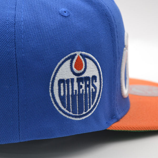 Edmonton Oilers Mitchell & Ness NHL VINTAGE SCRIPT Snapback Adjustable Hat -Royal/Orange