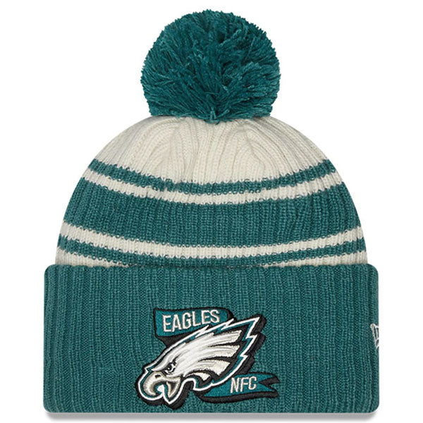 Philadelphia Eagles New Era 2022 Sideline Sport Cuffed Pom Knit Hat - Cream/Green